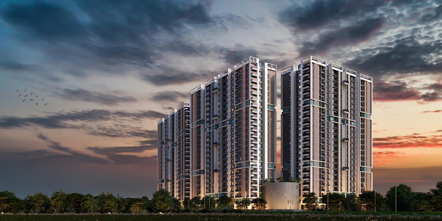 DTC Still Waters towers at night with illuminated facades